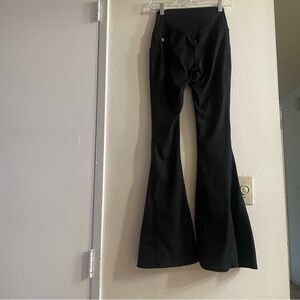 Popflex black bell bottom 31” crisscross waist leggings size small